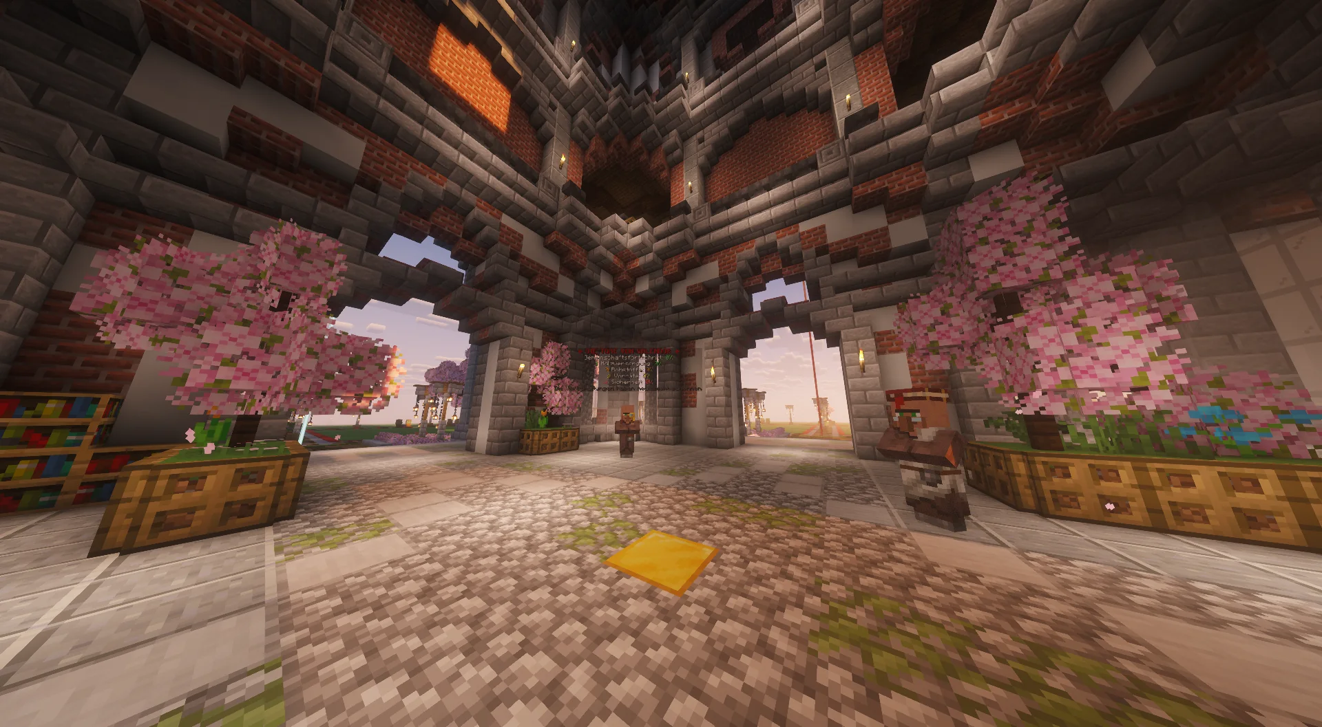 Große Halle am Spawn von VALENDOR mit Kirschbäumen und Steinarchitektur